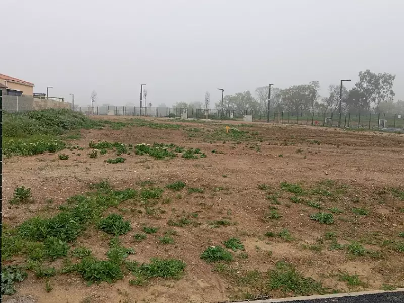 Terrain à bâtir, 457 m² - Pouzolles (34480)